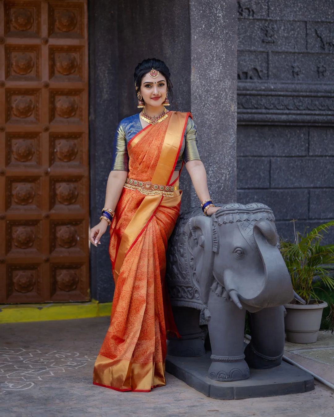Telugu TV Actress Sridevi Vijaykumar Images in Orange Saree Blue Blouse 1